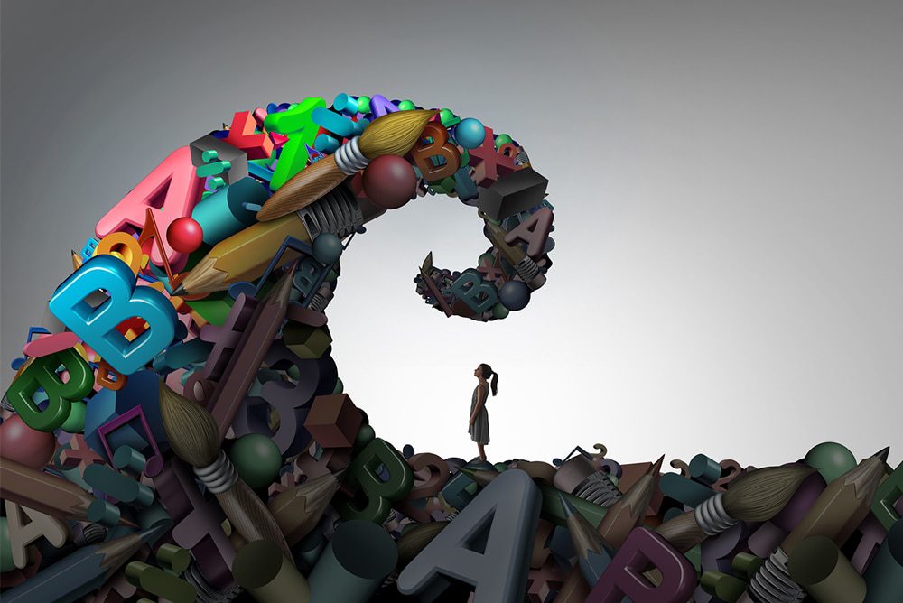 An animated character of a child looks up at a large pointed peak made out of colorful giant letters and art supplies